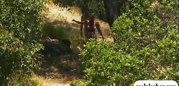  Two sexy cougars tanning while all naked in nude trail